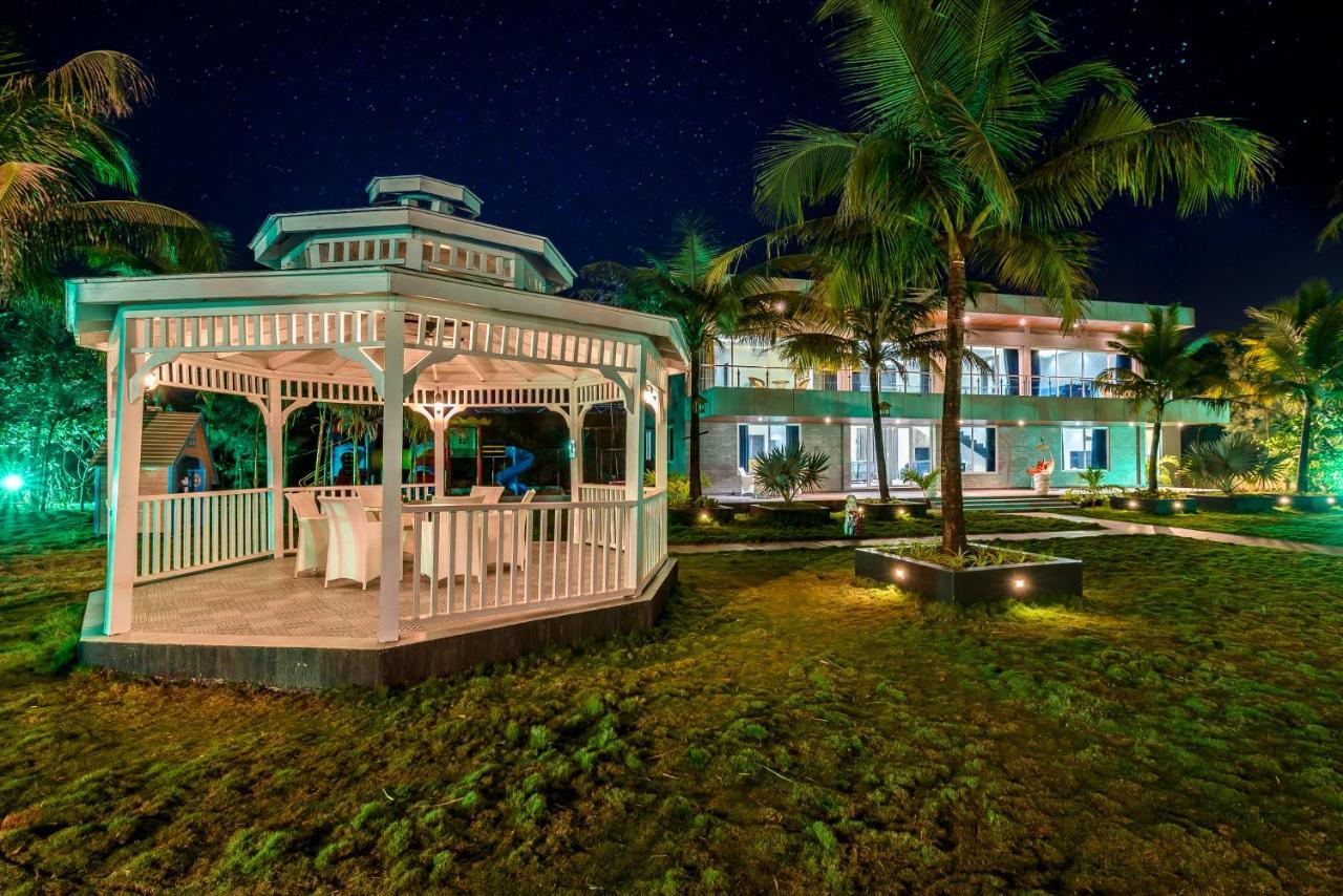 Saffronstays Palm Paradise, Kalyan Khadavli - Swimming Pool With Water Slides, Gazebo And Indoor Games Padghe Exterior foto